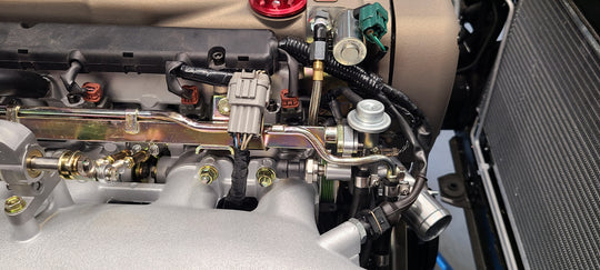 U.P.G RB26 fuel pressure adapter to OEM rail