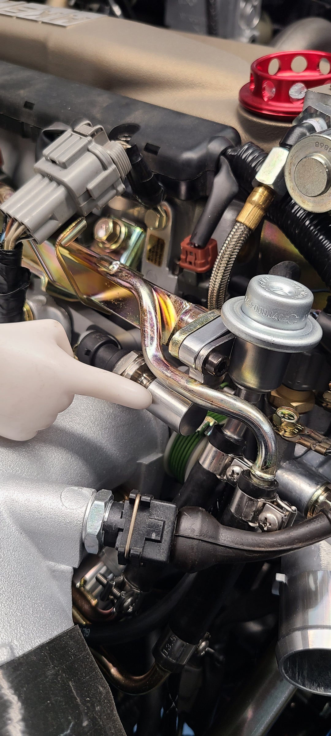 U.P.G RB26 fuel pressure adapter to OEM rail