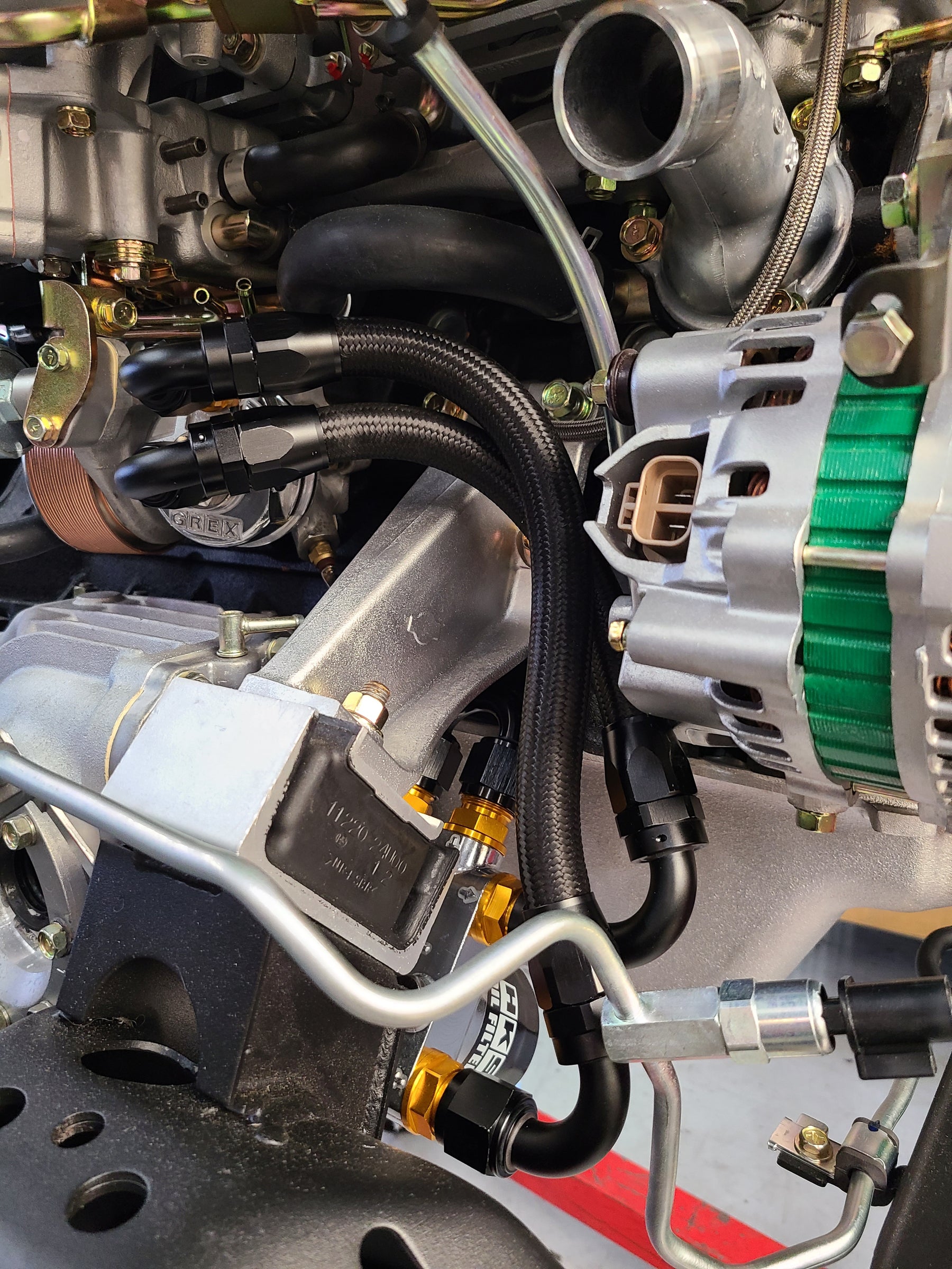 U.P.G Skyline GTR oil filter relocation kit with Greddy oil cooler ada